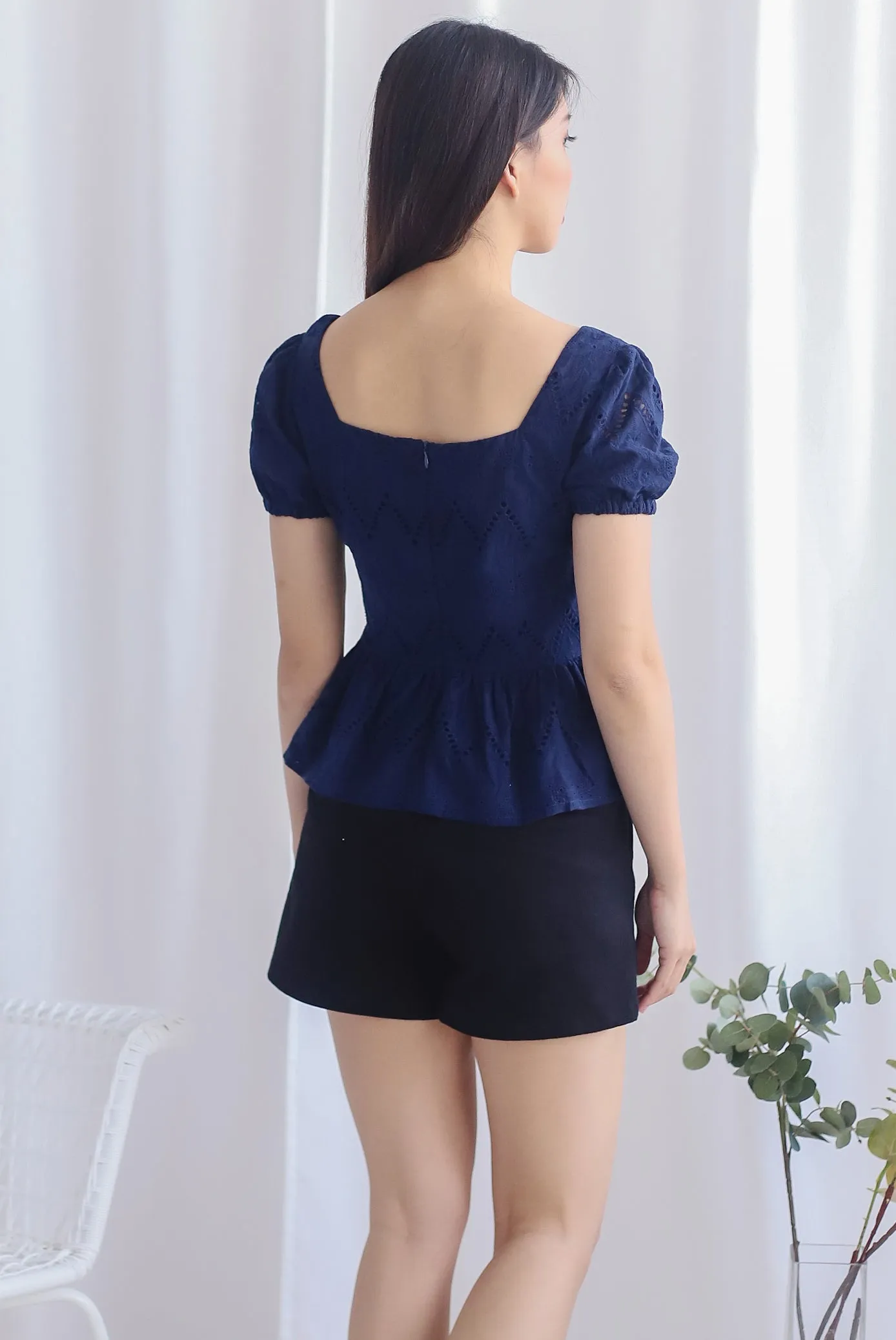 Amie Eyelet Pelum Top In Navy Blue
