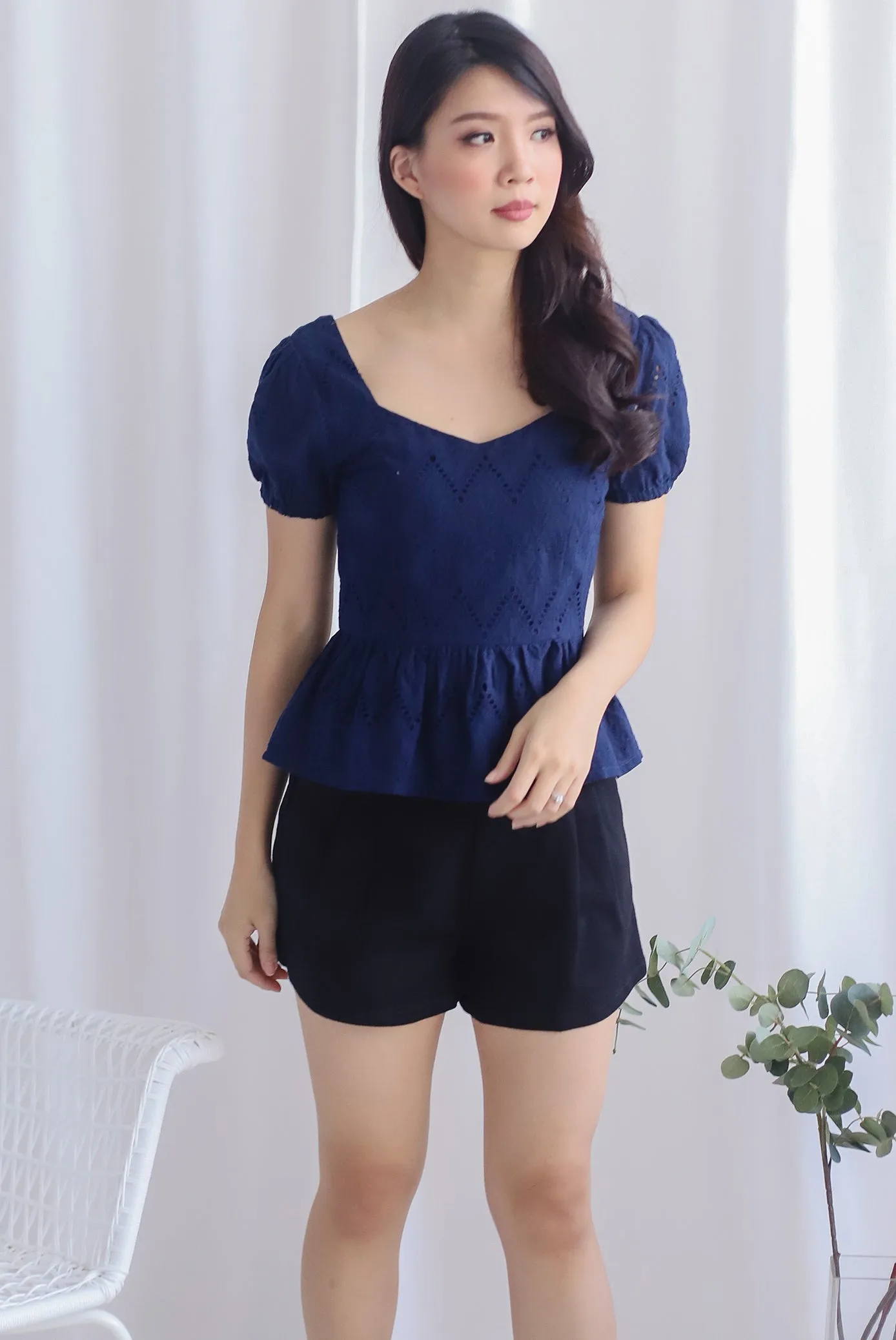 Amie Eyelet Pelum Top In Navy Blue
