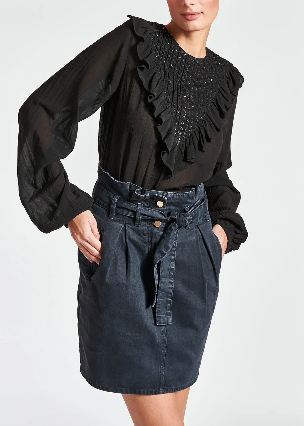 Black sequin-embroidered top with ruffles