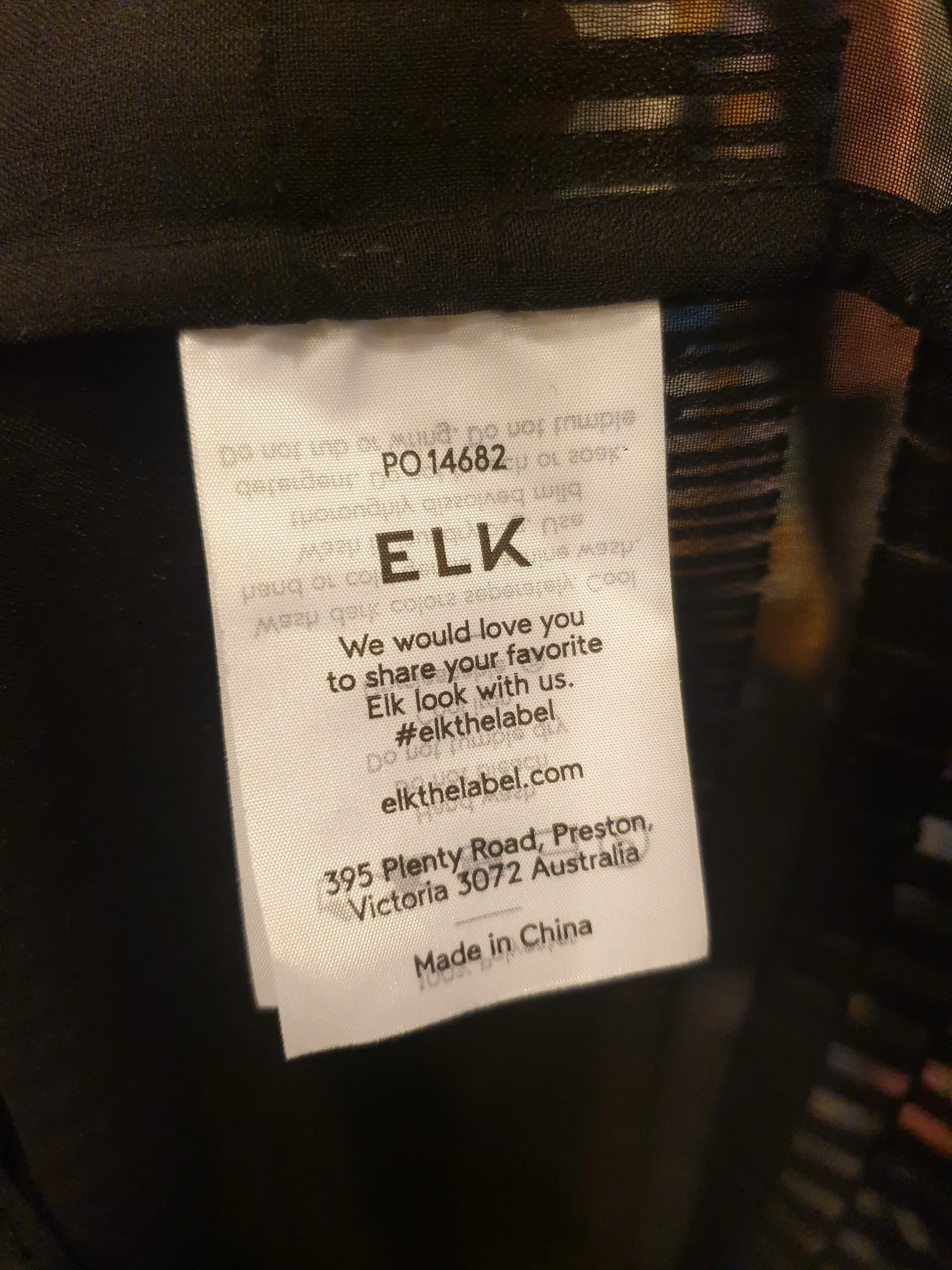 Elk black semi-sheer top size 10