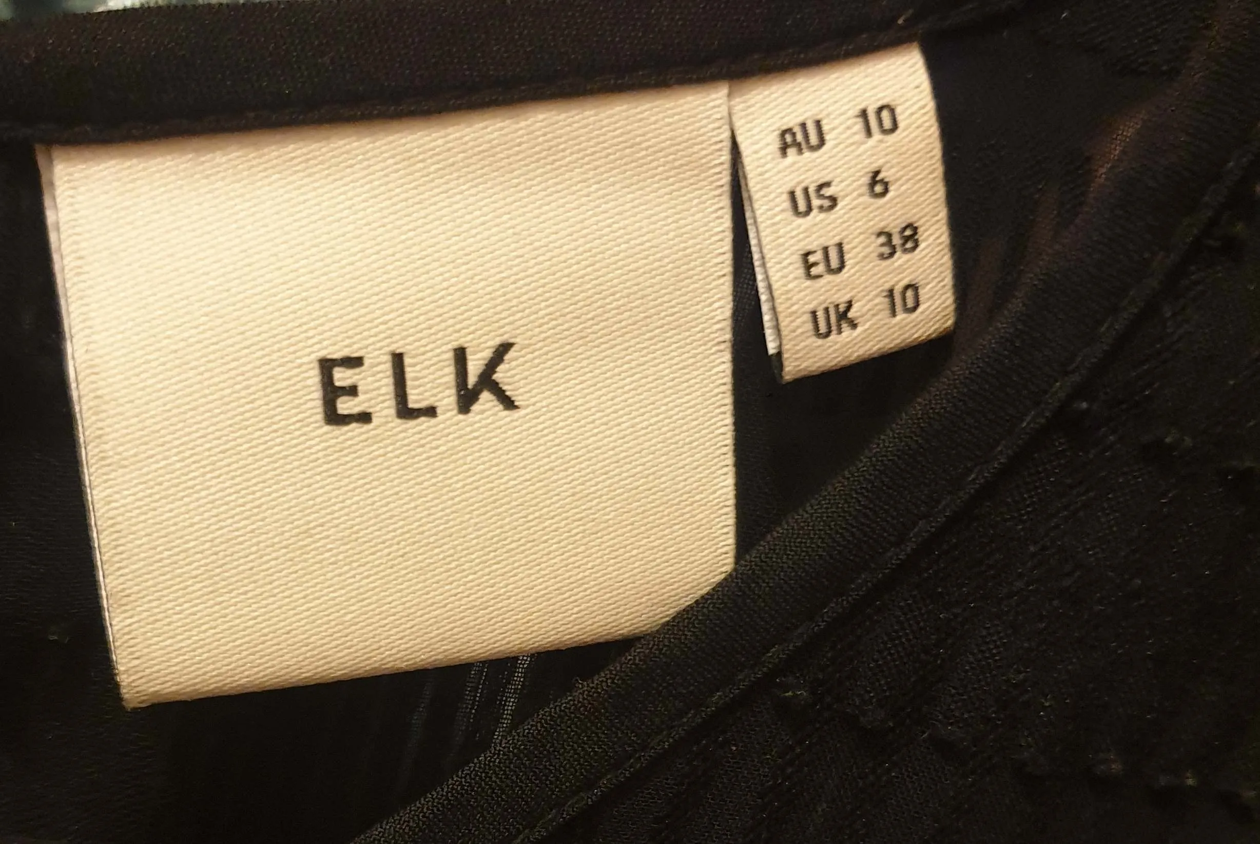Elk black semi-sheer top size 10