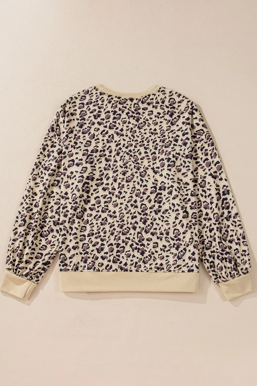 Joanie Slit Leopard Round Neck Long Sleeve Sweatshirt