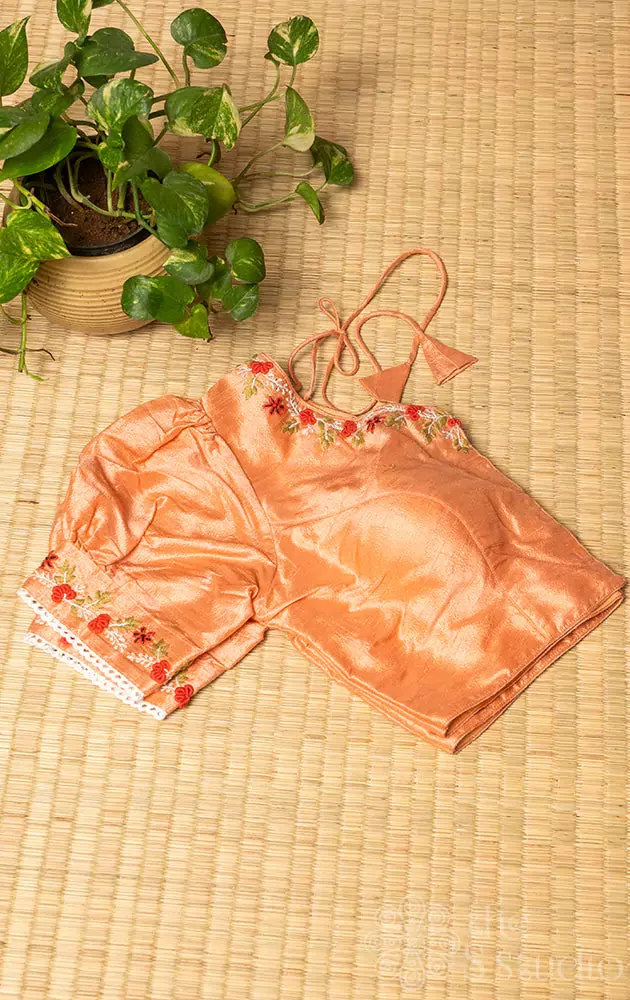 Peach  raw silk readymade blouse with hand embroidery.
