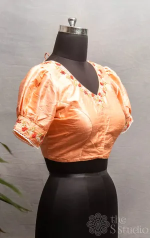 Peach  raw silk readymade blouse with hand embroidery.