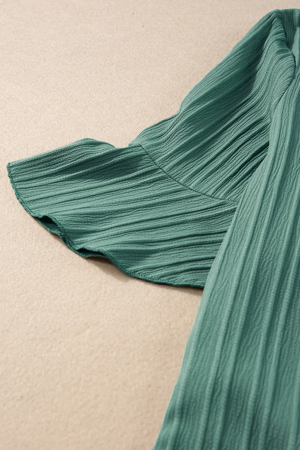Ruffled Short Sleeve V Neck Textured Blouse