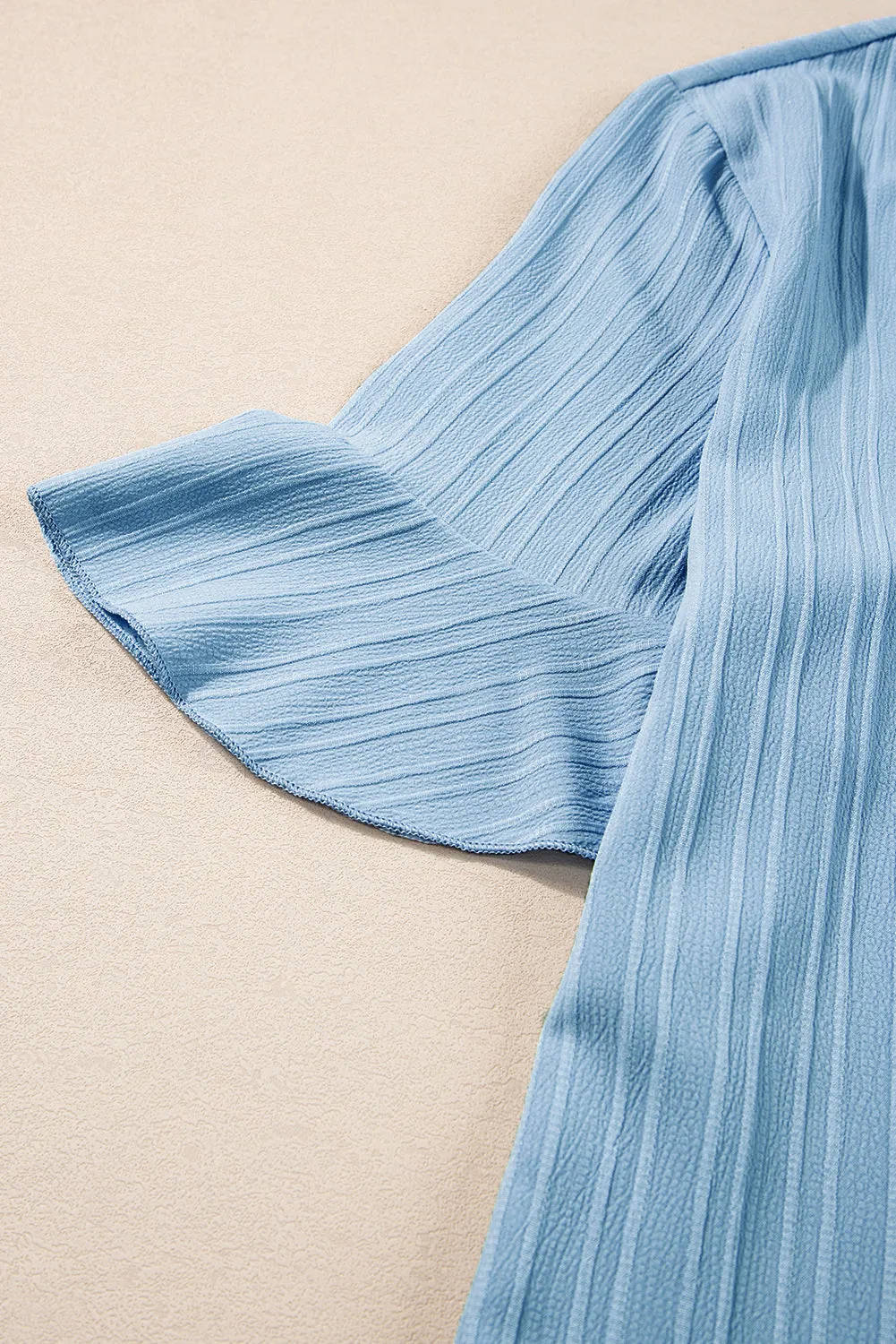 Ruffled Short Sleeve V Neck Textured Blouse